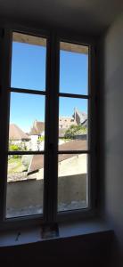 a window in a room with two windows at Maison de la radio Espace Philips in Sancerre