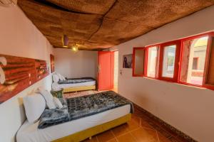 Postel nebo postele na pokoji v ubytování Riad Amira Luxury Palace
