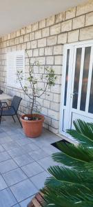 Patio alebo iná vonkajšia časť ubytovania Apartment Gitara
