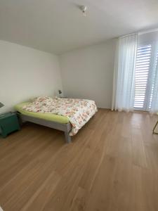 Postel nebo postele na pokoji v ubytování Upper Floor