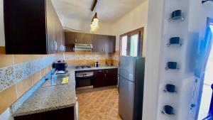 Kuchyň nebo kuchyňský kout v ubytování Appartement A6