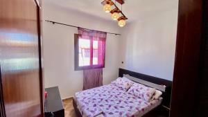 Postel nebo postele na pokoji v ubytování Appartement A6