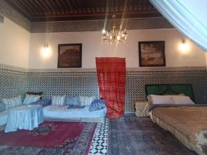 Voodi või voodid majutusasutuse Suite in a 19 century palace in the heart of Medina toas