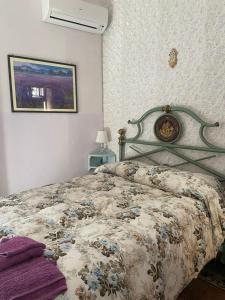 Postel nebo postele na pokoji v ubytování Casa Lina Bouganville