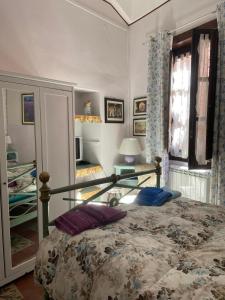 Postel nebo postele na pokoji v ubytování Casa Lina Bouganville