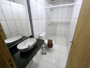 Koupelna v ubytování Hotel Vitória - Guaíra