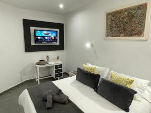 TV a/nebo společenská místnost v ubytování 14 on Botha