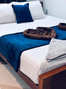 Postel nebo postele na pokoji v ubytování Hermanos Hideaway
