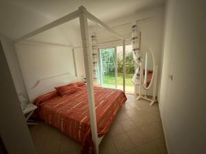 Postel nebo postele na pokoji v ubytování Logement Cozy avec Jardin et Piscine - Mer à 3 Minutes