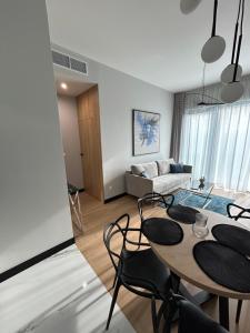 Posezení v ubytování Aparthotel NAD ZATOKĄ Jezioro Ukiel