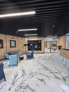 Posezení v ubytování Aparthotel NAD ZATOKĄ Jezioro Ukiel