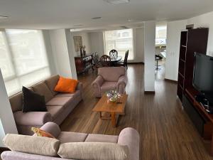 Posezení v ubytování Instant Hotel - Departamentos de lujo en Ambato