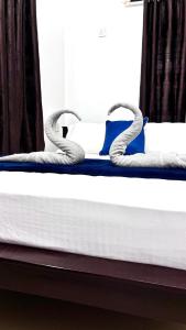 Postel nebo postele na pokoji v ubytování Hermanos Hideaway