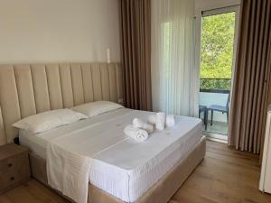 Postel nebo postele na pokoji v ubytování Hotel Vila AARON