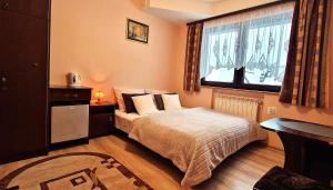 Posteľ alebo postele v izbe v ubytovaní Pokoje Apartamenty Pod Limbą
