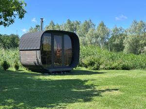 Zahrada ubytování Ipu Puhkemaja - Riverside Holiday Home