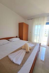 Postel nebo postele na pokoji v ubytování Lazorja Rooms
