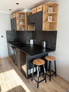 Η κουζίνα ή μικρή κουζίνα στο Ustka Centrum „ Dom Rybaka”