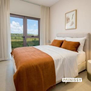 Postel nebo postele na pokoji v ubytování Minissy luxury Serviced Apartment