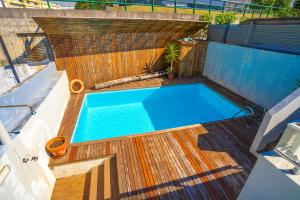 Bazén v ubytování Hostel AzorAzul - Pool & Suite nebo v jeho okolí