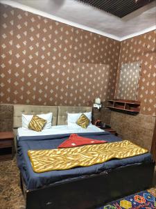 Postel nebo postele na pokoji v ubytování Hotel metroview