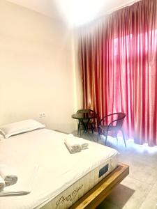 Letto o letti in una camera di Hotel Barbare