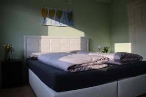 Voodi või voodid majutusasutuse Felsenblick toas