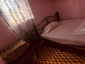 Postel nebo postele na pokoji v ubytování Hotel afriquia