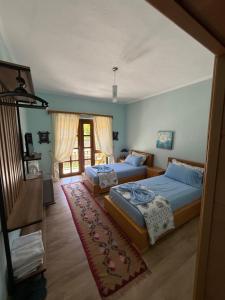 Giường trong phòng chung tại Guest House Lin