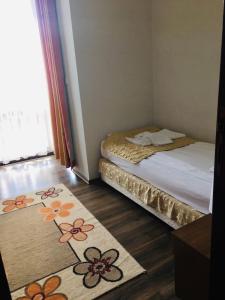 Giường trong phòng chung tại Beautiful two bedroom 4th floor apartment in Elegant Luxe Hotel with pool, sauna, gym and steam room +22 ảnh