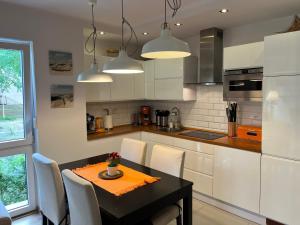 Kuchyňa alebo kuchynka v ubytovaní Apartament Marcin