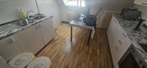 Kuchyň nebo kuchyňský kout v ubytování Monteurzimmer Bierweg 31a