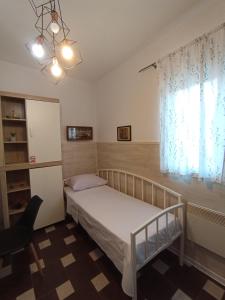 Postel nebo postele na pokoji v ubytování Adriatica Apartments