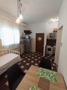 Kuchyň nebo kuchyňský kout v ubytování Adriatica Apartments