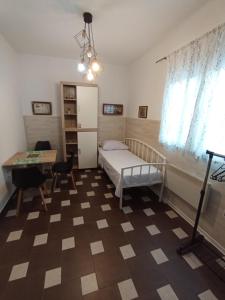 Postel nebo postele na pokoji v ubytování Adriatica Apartments