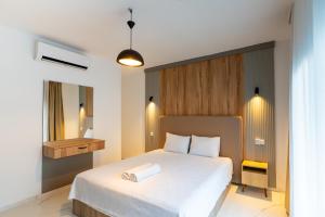 Katil atau katil-katil dalam bilik di Melengeç Otel Türkbükü +28 gambar