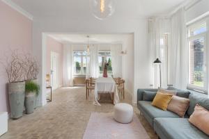 Posezení v ubytování Vakantiewoning 't Hovenshuis