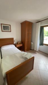 Postel nebo postele na pokoji v ubytování Albergo Miravalle