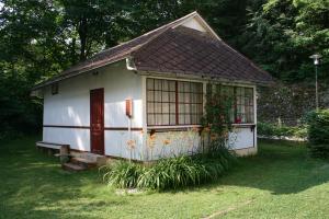 En have udenfor Seeappartements Excelsior Gartenpavillon