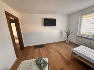 Postel nebo postele na pokoji v ubytování Dein Zuhause auf Zeit Halle Reideburg w1