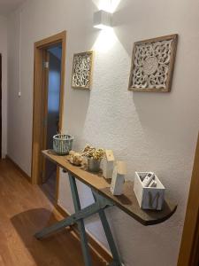 a room with a table with some items on it at Casa na Quinta in Elvas