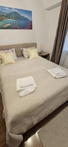 Postel nebo postele na pokoji v ubytování Apartament Nou, Complet Utilat, Ideal pentru Familii, Aproape de Mall, Parc și Plajă