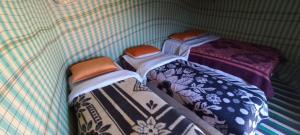 Postel nebo postele na pokoji v ubytování magical saharain camp
