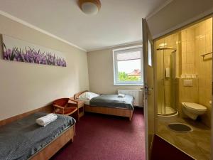 Koupelna v ubytování Hotel Paola