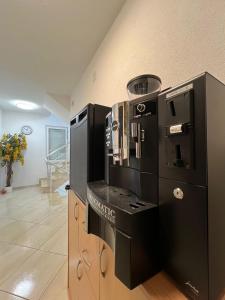 Kuchyň nebo kuchyňský kout v ubytování Apartments Edona
