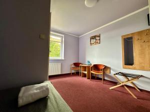 Posezení v ubytování Hotel Paola