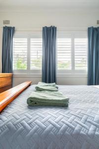 Postel nebo postele na pokoji v ubytování U3 Comfortable Unit in Cronulla