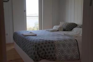Ein Bett oder Betten in einem Zimmer der Unterkunft Moinhos da Corga