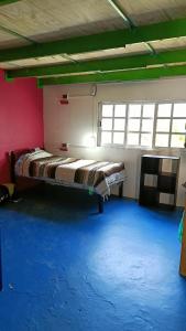 Ένα ή περισσότερα κρεβάτια σε δωμάτιο στο Hostal Don Diego