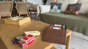 Les Griselles 3 Hauts Baie Orientale - Appart 1ch 4p vue MER的休息区